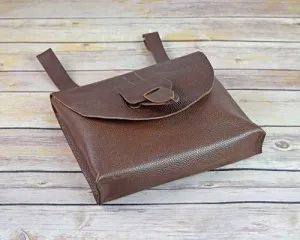 Brown leather pouch bag with leather fastening